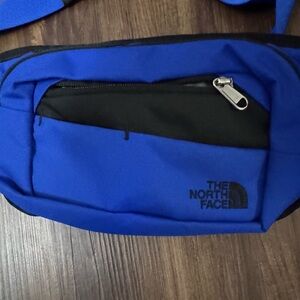 The North Face Blue and Black Belt Bag Sporty and Durable